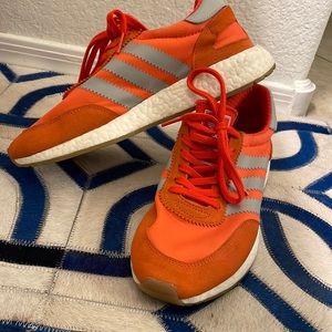 Adidas bright orange Iniki shoe